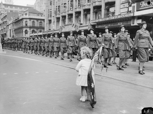 A child watches the march, 1942 Medium